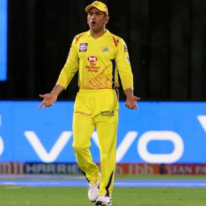 Dhoni fined after entering field; arguing with umpires