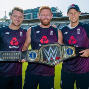 PIX: England team receives WWE championship title