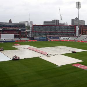 Play abandoned as rain persists over Old Trafford