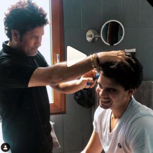 SEE: Sachin gives son Arjun a haircut