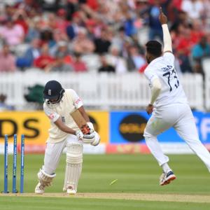 PHOTOS: Root holds firm after Siraj rocks England