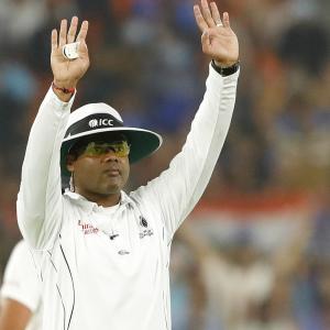 This Indian umpire keeps the blue flag flying high