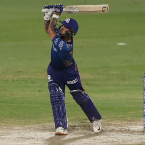 IPL PIX: Mumbai humble Royals to stay in play-off race
