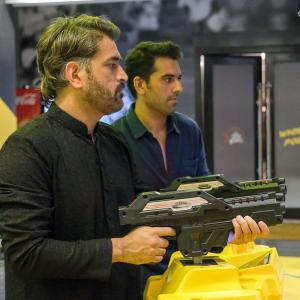 SEE: What's Dhoni Doing With A Gun?