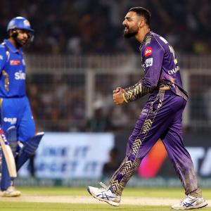 IPL PIX: KKR outclass MI; storm into play-offs