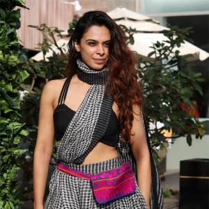 WOW! This hottie wore a sari with a bralette