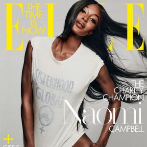 Is Naomi Campbell wearing just a T-shirt?