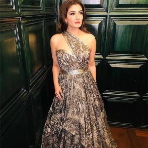Raveena steals the spotlight in a one-shoulder dress