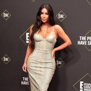 Hot alert! Kim sizzles in a figure-hugging gown