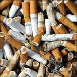 Australia imposes tough rules on cigarette firms