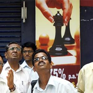 Sensex ends shy of 28K; metals gain, auto stocks slip