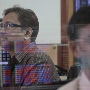 Markets trip on China growth concerns, Sensex loses 109 points