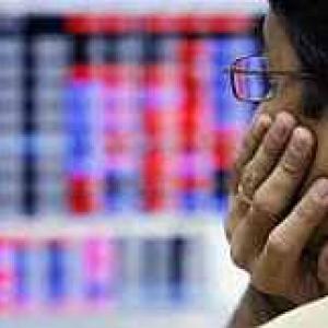 Markets end flat on global cues