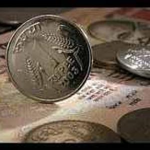 Rupee gains 60 paise vs dollar in early trade
