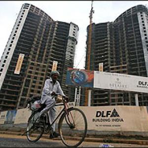DLF shares sink 9% on court order