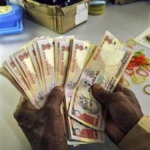 Rupee ends 7 paise down vs. dollar at 54.21