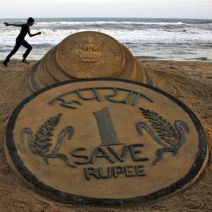 Falling rupee can help resolve India's economic woes