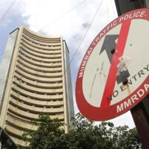 Sensex plunges to two-week low on global cues