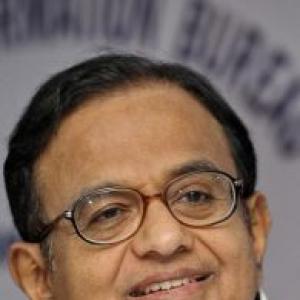 Rupee woes: Chidambaram meets PM, RBI Governor