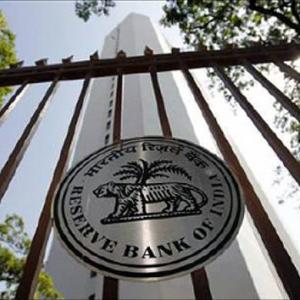 Weak rupee, high inflation force RBI to hold rates
