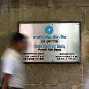 SBI buying property for housing staff in Singapore