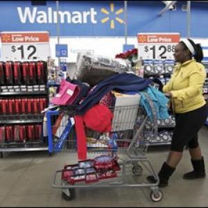 Wal-Mart profits may be hit by overseas bribery probe