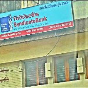 Syndicate Bank brass in damage control
