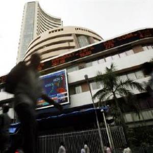 Markets scale new highs; Nifty ends shy of 7,900
