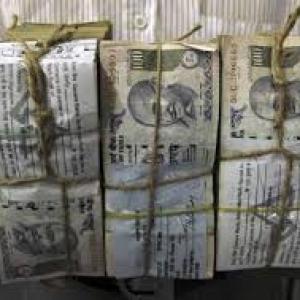 Rupee weakens, but sentiment strong a year after record lows