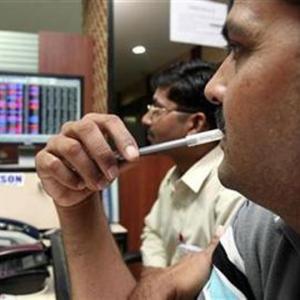 Markets surge on rate cut hopes; Sensex zooms 400 points
