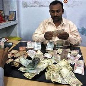 Rupee rises 8 paise to 62.15 Vs dollar in late morning trade