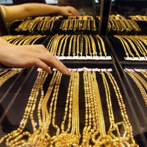 Gold slips from 5-month high, down Rs 150 on low demand