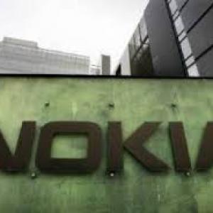Nokia says Microsoft deal to be delayed by a month
