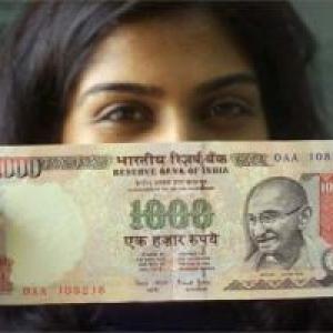 Rupee at near 10-month closing high; RBI remains active