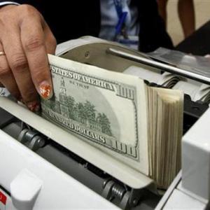 Rupee recovers from 2-year low, still down 17 paise