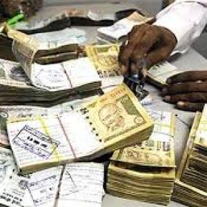 Rupee ends almost flat on Asian cues