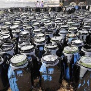 India may delay oil company share sales