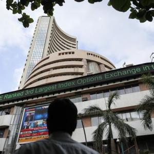 Sensex drops 297 points;  Infosys slumps 6% on muted guidance