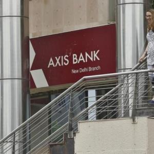 Axis Bank dismisses 24 staffers, suspends 50 accounts