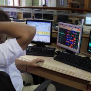 Sensex trims losses; bluechips climb higher