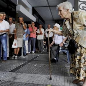 Relief and anger in Greece as Tsipras strikes deal