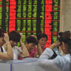 China stocks sink as panic selling intensifies