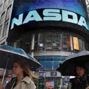 Nasdaq at record high as Wall Street runs on strong data