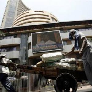 Markets stumble on global cues; Sensex loses 85 points