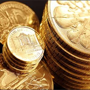 Gold weakens on sluggish demand; silver strengthens