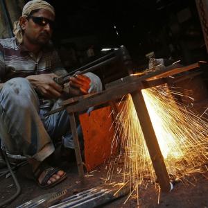 Factory growth likely slowed in Jan, inflation to stay muted