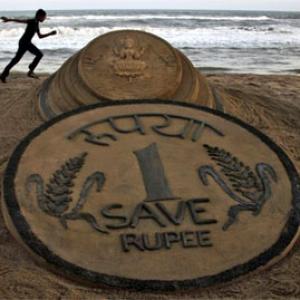 Rupee firms up 5 paise against dollar