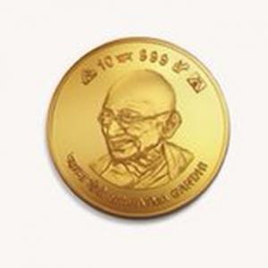 Modi launches gold schemes, coin with Ashok Chakra
