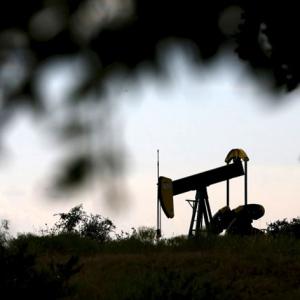 Oil's slide below $30 sends shockwaves far and wide