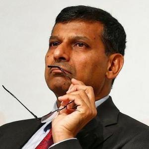 Sell stakes in PSUs to boost growth: Rajan tells FM